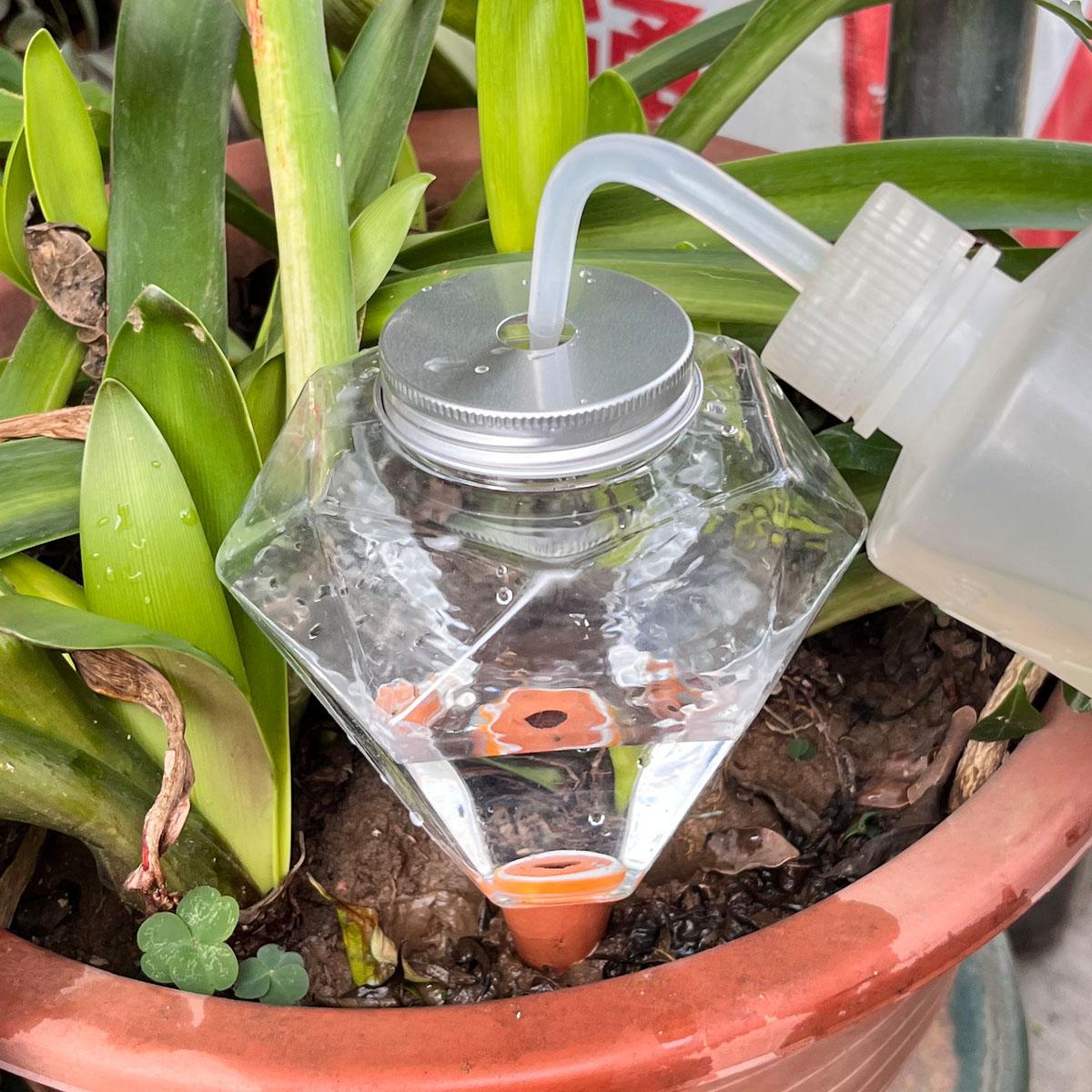 1pcs Cute Plastic Watering Mac - Plant Watering Globe recensie en prijs